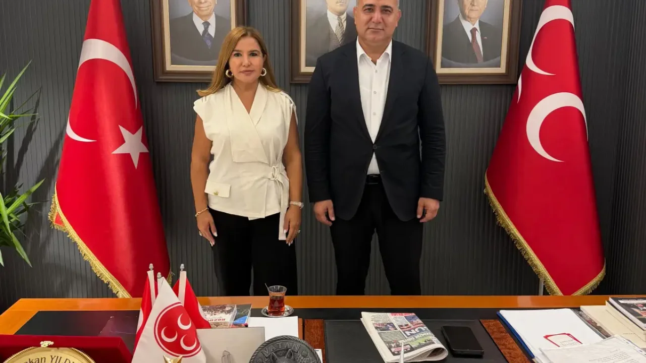 Dr. Demet Çardak, MHP Adana İl Başkanı Yıldırım'ı.
