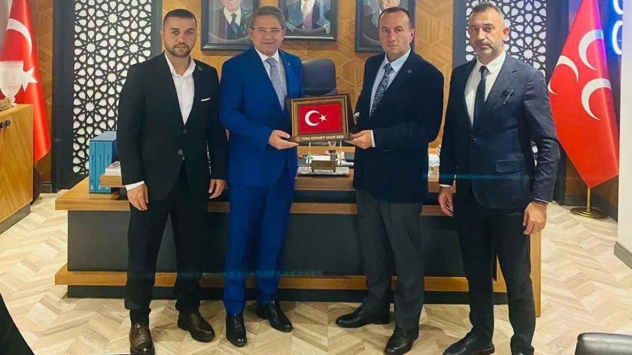 MHP Bursa İl Başkanı Özcanbaz'ı Sendika Yönetimi.